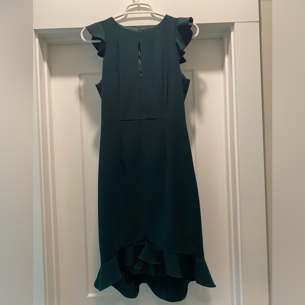 Worn once, great condition. Fitted mini dress with a slight high-low.